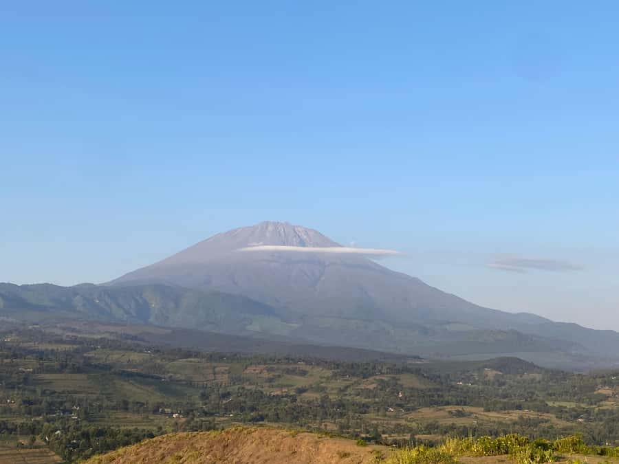 Arusha: Golden Hour Walk & Sunset Viewpoint Over Mount Meru - Walking through farms and local homes