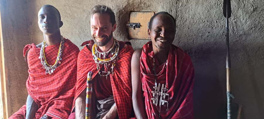 Arusha: Maasai Village Tour - Entering the Maasai boma with a village elder