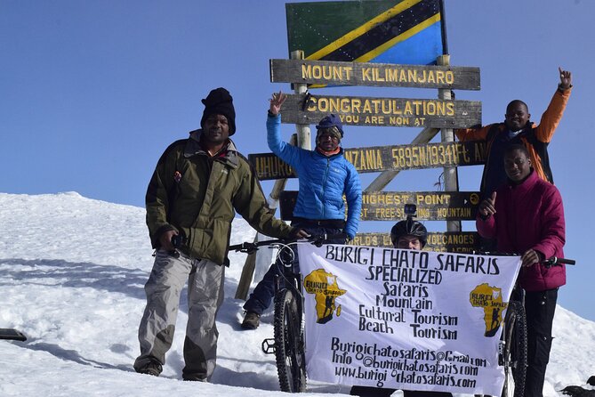Best 5 Days Kilimanjaro Bike Trek Tour via Marangu Kilema Route - Day four: Gilman’s Point, Uhuru Peak, and the long return