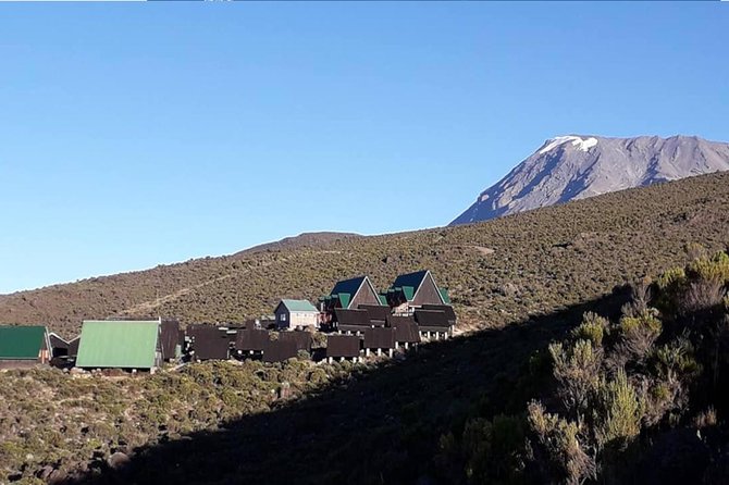 Conquer Kilimanjaro: 5-Day Marangu Route Adventure - Huts, Food, Water, and Washing