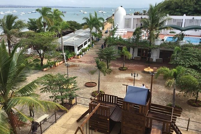 Dar es Salaam City Tour - Everyday - Tingatinga Arts Cooperative: bright paint and local scenes