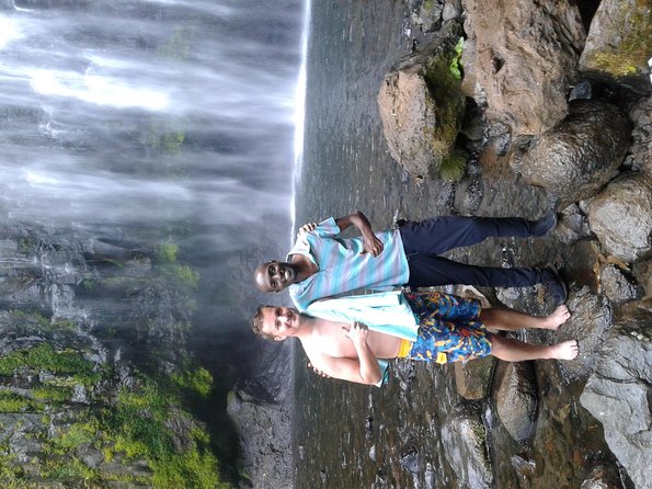 Day Trip Coffee Tour and Materuni Waterfalls - Making coffee the traditional way