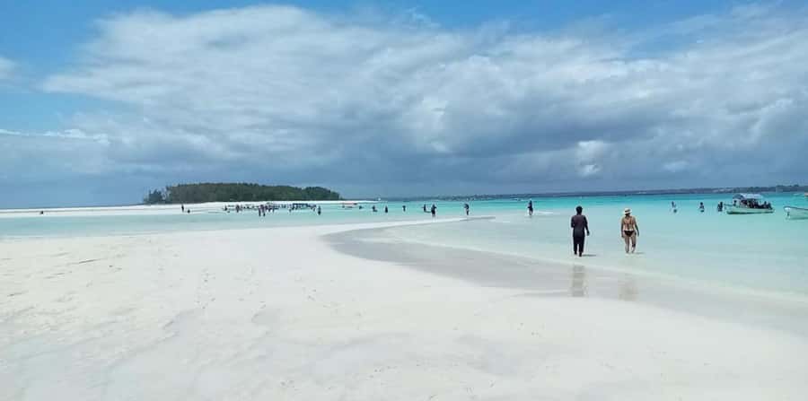 FROM NUNGWI; MNEMBA SNORKELING AND DOLPHIN TOUR - Returning along the Zanzibar coast