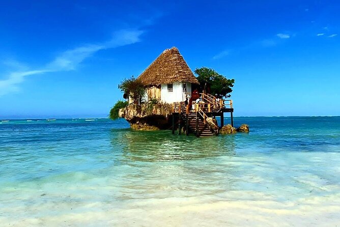 Full-day Tour Mnemba Jozani Forest Kuza Cave Paje Beach The Rock - The Rock: an iconic finish by the tide