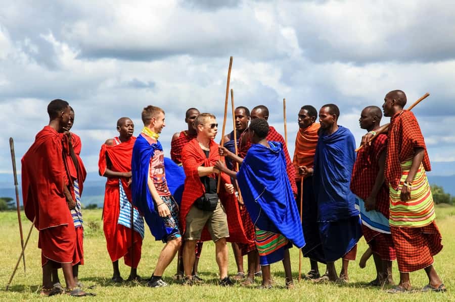 Kilimanjaro: Maasai Village Visit, Waterfalls, & Coffee Tour - Grinding coffee the traditional way