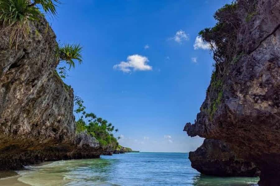 Kuza Cave, Hidden Mtende Beach & The Rock Restaurant - Kuza Cave and its clear underground pool
