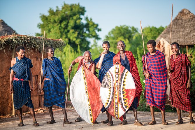 Maasai World - Trying the traditional bow and arrow