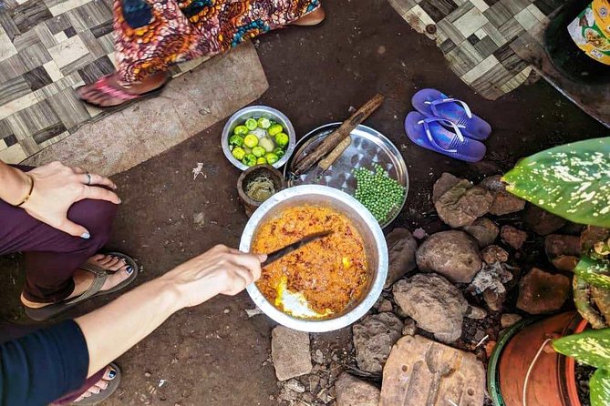 Private Market Tour and Tanzanian Cooking Class in Moshi - Making coconut milk with a buzi