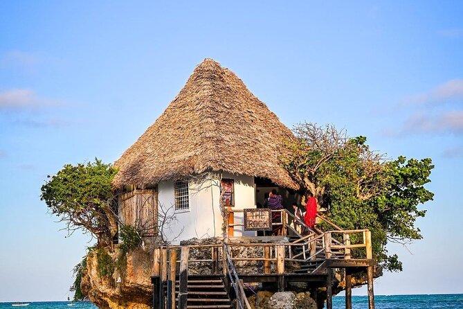 Starfish Beach; The Rock; Paje Beach; Jozani Forest; Salaam Cave - The Rock Restaurant and its extra lunch bill