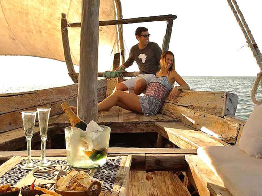 Stone Town: Sunset Dhow Cruise Experience - Riding a working-style Arabian dhow