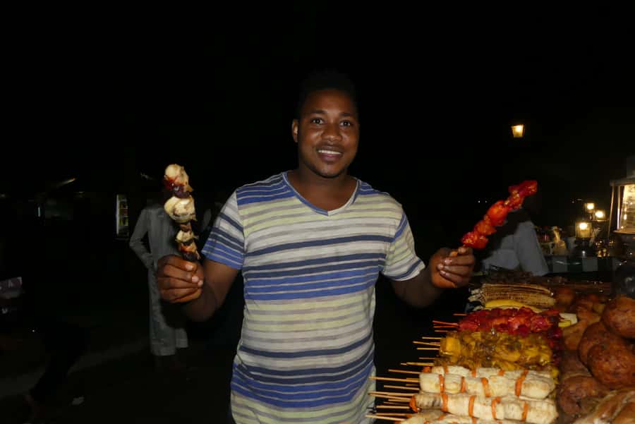 Stonetown: Food Markets and Street Food Walking Tour - Walking through Stone Town after dark