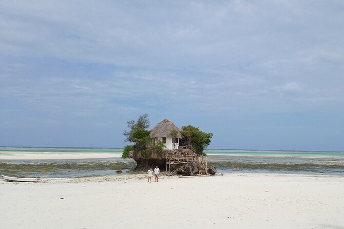 The Rock Restaurant & Blue Lagoon Half Day Tour in Zanzibar - Hotel pickup, vehicles, and communication