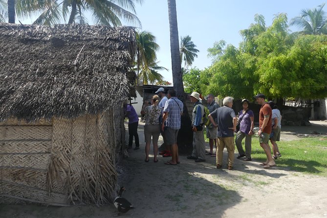 Village Tour With Witch Doctor Visit - Learning to make rope from coconut husk