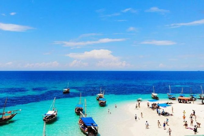 Zanzibar Dhow Cruise day adventure, sea sports at Kwale Island, very memorable - The sandbank stop is made for swimming