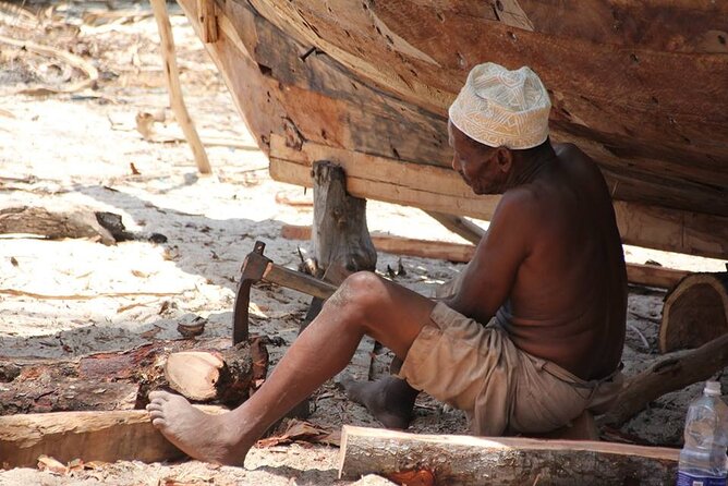 Zanzibar Full Day Mnemba Island, Nungwi and Kendwa Beach Tour - Nungwi fishing village, market, and dhow building