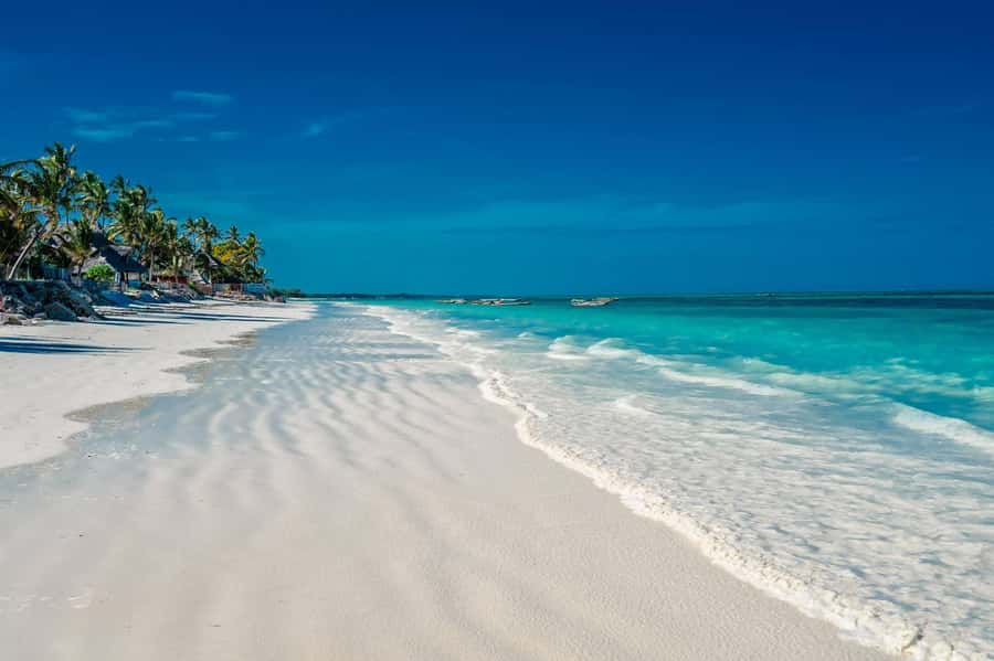 Zanzibar: Mnemba Island Atoll Guided Day Trip - Paje Beach: beautiful sand with a few practical catches