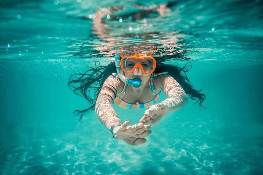 Zanzibar Mnemba island snorkling & swim with turtles Tour - Two Zanzibar marine experiences in one day
