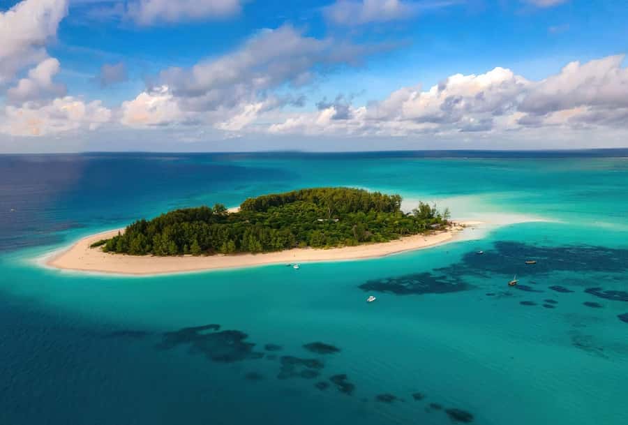 Zanzibar Mnemba island snorkling & swim with turtles Tour - Leaving Zanzibar for Mnemba Island