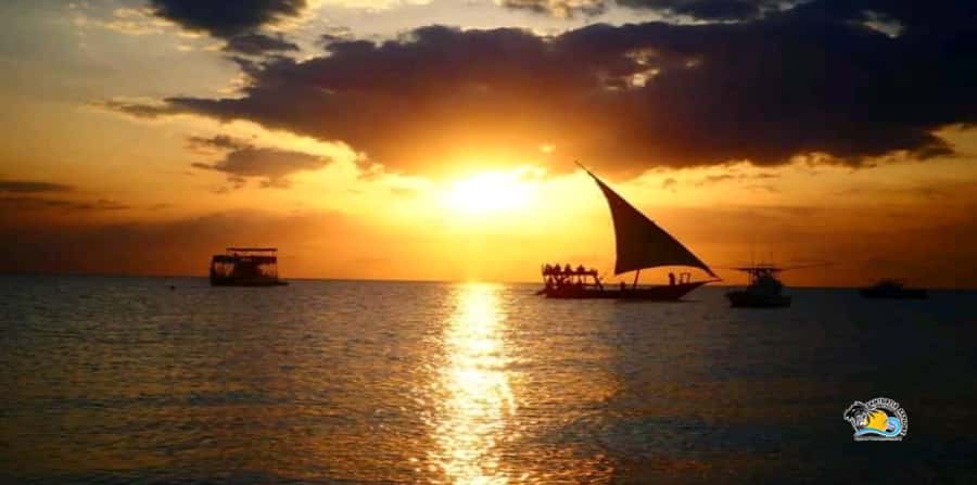 Zanzibar: Nungwi/Kendwa Beach Sunset Dhow Cruise with Fruits - Watching the sun set between Nungwi and Kendwa